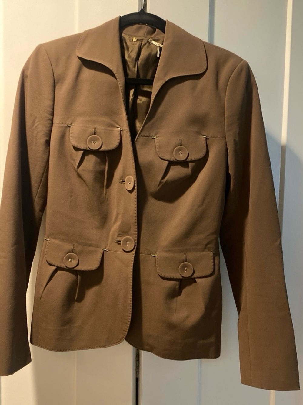 Women’s Tailored Brown Button-Front Jacket. I believe it’s Juicy Couture.